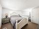 The bedroom features a large bed, nightstands, and a dresser at 5307 47Th Street E Ct, Bradenton, FL 34203