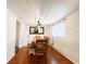 Bright dining room featuring a wooden dining table and a large mirror at 5307 47Th Street E Ct, Bradenton, FL 34203