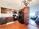 The kitchen features stainless steel appliances, wooden cabinets, and sleek countertops at 5307 47Th Street E Ct, Bradenton, FL 34203
