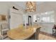Bright dining room offering a view of the kitchen and comfortable seating at 5632 Ashton Lake Dr # 5632, Sarasota, FL 34231