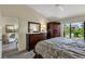 Inviting bedroom with dresser, wardrobe, and natural lighting at 5632 Ashton Lake Dr # 5632, Sarasota, FL 34231