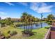 Scenic view of the lake with palm trees from the community at 5632 Ashton Lake Dr # 5632, Sarasota, FL 34231