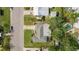 Aerial view of the home shows its position near a community pool at 5706 10Th Avenue Dr W, Bradenton, FL 34209
