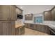 Modern kitchen featuring stainless steel appliances, stylish cabinets and a wine fridge at 5706 10Th Avenue Dr W, Bradenton, FL 34209