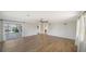 Spacious living area featuring sliding glass doors leading to outdoor living and natural light at 5706 10Th Avenue Dr W, Bradenton, FL 34209