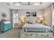 Cozy bedroom with tray ceiling, stylish furniture, neutral tones and carpeted floor at 5904 114Th E Dr, Parrish, FL 34219