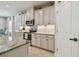 Charming kitchen featuring custom cabinets, granite countertops, and stainless steel appliances at 5904 114Th E Dr, Parrish, FL 34219