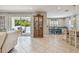 Bright and airy living space with sliding glass doors leading to the outdoor patio at 5904 114Th E Dr, Parrish, FL 34219