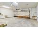 This is an attached garage with a sink, tool storage and an automatic garage door opener at 6203 Courtside Dr # 21, Bradenton, FL 34210