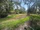 Spacious backyard offers a serene and private outdoor space at 647 Woodlawn Dr # 647, Bradenton, FL 34210