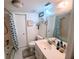 Bathroom with shower-tub, toilet, sink and storage at 647 Woodlawn Dr # 647, Bradenton, FL 34210
