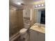 Bathroom featuring a glass shower and stylish vanity at 647 Woodlawn Dr # 647, Bradenton, FL 34210