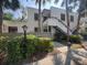 Inviting two-story condo with a private entrance and lush landscaping at 647 Woodlawn Dr # 647, Bradenton, FL 34210