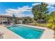 Private backyard pool with lounging area and lush landscaping for a serene retreat at 6708 11Th Nw Ave, Bradenton, FL 34209