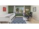 Bedroom with a view, modern decor, and a dedicated workspace at 6708 11Th Nw Ave, Bradenton, FL 34209