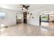 Bright living room with tiled floors and open access to other rooms at 6708 11Th Nw Ave, Bradenton, FL 34209