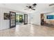 Spacious room with decorative tile flooring and view of office area at 6708 11Th Nw Ave, Bradenton, FL 34209