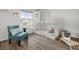 Bright bedroom with custom bunkbeds and a sitting area at 6708 162Nd E Pl, Parrish, FL 34219