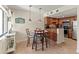 Cozy dining area with warm wood accents and pendant lighting for a relaxing dining experience at 6713 Midnight Pass Rd # 4, Sarasota, FL 34242