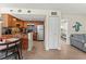 A beautifully maintained kitchen boasts stainless steel appliances and warm wood cabinets at 6713 Midnight Pass Rd # 4, Sarasota, FL 34242