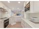Bright kitchen featuring new appliances and cabinetry with lots of countertop space at 7000 Gulf Dr # 205, Holmes Beach, FL 34217