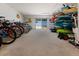 Spacious ground-floor storage room stocked with bikes, kayaks, and surfboards at 7000 Gulf Dr # 205, Holmes Beach, FL 34217