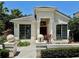Inviting single-story home with large windows and manicured landscaping at 7330 Kensington Ct, University Park, FL 34201