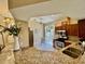 Well-lit kitchen featuring stainless steel appliances and granite countertops, blending functionality with style at 7330 Kensington Ct, University Park, FL 34201