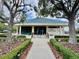 Community tennis and fitness center with beautiful landscaping and plenty of parking at 7330 Kensington Ct, University Park, FL 34201