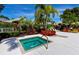 Tranquil outdoor hot tub offers a private retreat with lush landscaping and a serene ambiance at 7821 Troon Ct, Lakewood Ranch, FL 34202