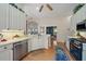 Bright, updated kitchen with stainless steel appliances and open floor plan at 7821 Troon Ct, Lakewood Ranch, FL 34202