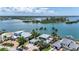 Desirable waterfront properties near serene bay, surrounded by swaying palms offering picturesque scenery at 878 Freeling Dr, Sarasota, FL 34242