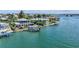 A coastal community with luxury waterfront homes with boat docks, combining stunning residences with access to waterways at 878 Freeling Dr, Sarasota, FL 34242