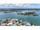 Picturesque waterfront neighborhood featuring luxurious homes with private docks and lush tropical landscaping at 878 Freeling Dr, Sarasota, FL 34242
