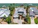 Stunning aerial view of a luxurious home boasting lush landscaping, and convenient boat access at 878 Freeling Dr, Sarasota, FL 34242