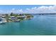 Waterfront neighborhood featuring luxury homes with private boat docks, allowing for easy access to boating and water activities at 878 Freeling Dr, Sarasota, FL 34242
