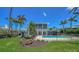 Stunning two-story home featuring a private pool, screened enclosure, and beautifully landscaped backyard oasis at 878 Freeling Dr, Sarasota, FL 34242