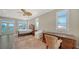 Bedroom featuring a bed, a desk with chair, lots of natural light, and beautiful views at 878 Freeling Dr, Sarasota, FL 34242