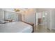 Bedroom with dresser and access to hallway at 878 Freeling Dr, Sarasota, FL 34242