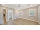 Bedroom with neutral walls, windows, and ensuite bathroom at 878 Freeling Dr, Sarasota, FL 34242