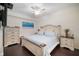 Relaxing bedroom features light blue bedding and decorative wooden furnishings at 910 Tidewater Shores Loop # 103, Bradenton, FL 34208