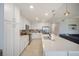 Gorgeous kitchen features stainless appliances, an oversized island with seating, and an open floorplan at 910 Tidewater Shores Loop # 103, Bradenton, FL 34208
