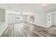 Bright living room features sleek flooring, neutral paint, and ample natural light at 920 Myrtle Ave, Venice, FL 34285