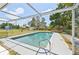 Outdoor pool in backyard with metal frame and ample yard space for relaxation at 920 Myrtle Ave, Venice, FL 34285