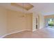 Dining room with decorative lighting, neutral walls and tile floors at 935 River Basin Ct # 102B, Bradenton, FL 34212