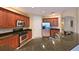 Well-equipped kitchen with stainless steel appliances, granite countertops, and ample cabinet storage at 935 River Basin Ct # 102B, Bradenton, FL 34212