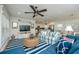 Inviting living area featuring blue and striped furnishings, open to modern kitchen at 102 & 104 48Th St, Holmes Beach, FL 34217