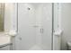 Bright bathroom features a glass shower enclosure with white subway tile at 102 & 104 48Th St, Holmes Beach, FL 34217
