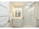 Clean and modern bathroom with glass shower and white subway tile at 102 & 104 48Th St, Holmes Beach, FL 34217