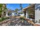 Home exterior highlighting the yard space and landscaping at 120 Hammock Rd, Anna Maria, FL 34216